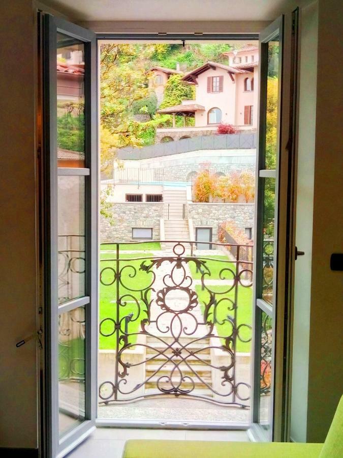 Castelli Delux Apartment Менаджо Екстериор снимка